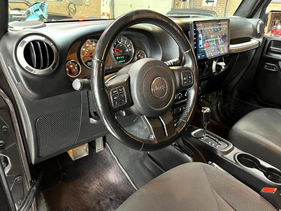 used 2016 Jeep Wrangler Unlimited car, priced at $33,985