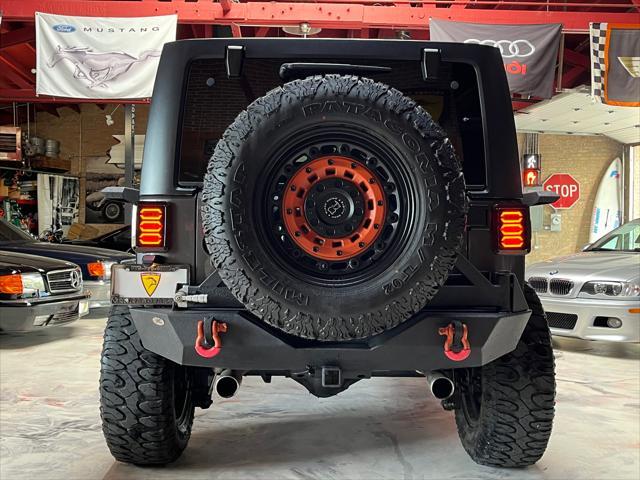 used 2016 Jeep Wrangler Unlimited car, priced at $29,985