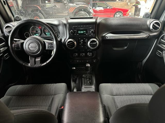 used 2011 Jeep Wrangler Unlimited car, priced at $13,985