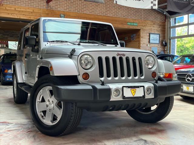 used 2011 Jeep Wrangler Unlimited car, priced at $13,985