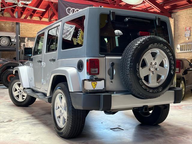 used 2011 Jeep Wrangler Unlimited car, priced at $13,985