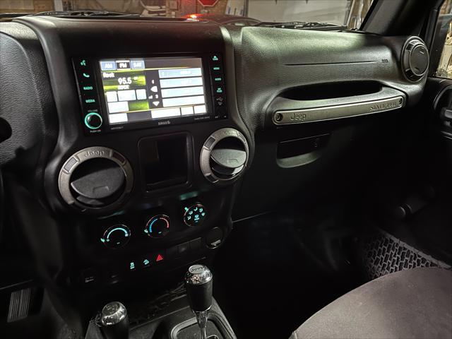 used 2015 Jeep Wrangler car, priced at $16,985