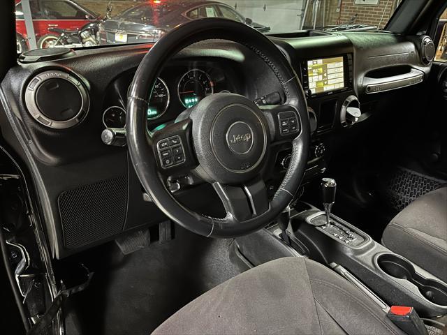 used 2015 Jeep Wrangler car, priced at $16,985