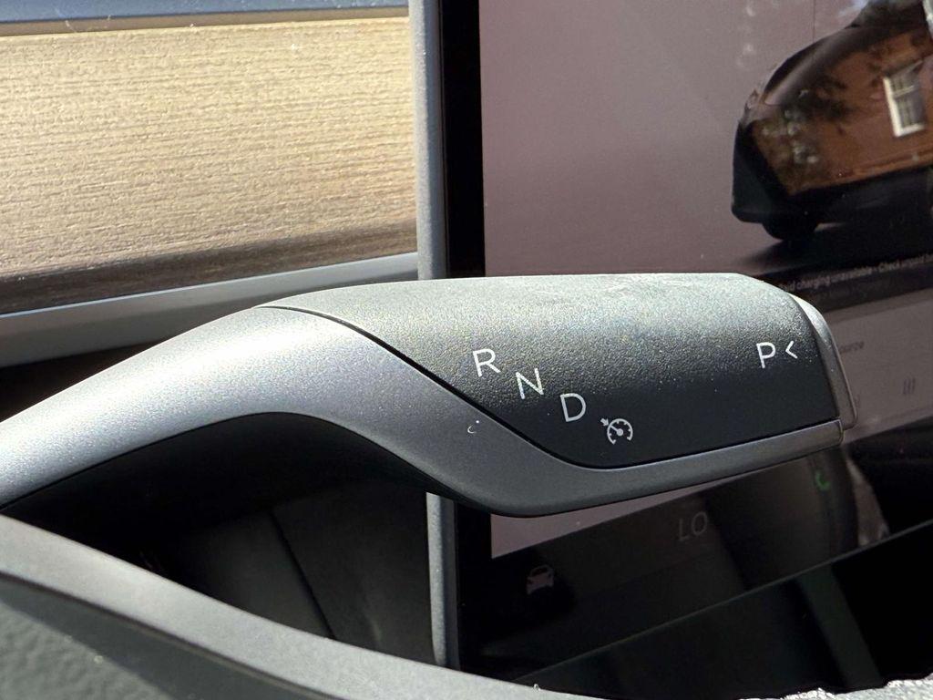 used 2024 Tesla Model Y car, priced at $32,900