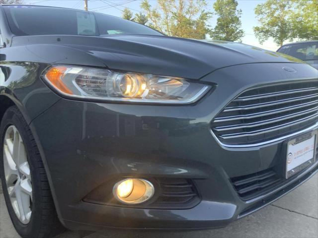 used 2016 Ford Fusion car, priced at $15,995