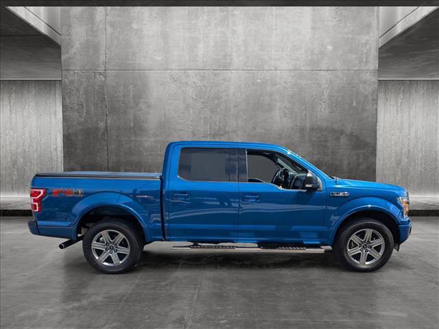 used 2018 Ford F-150 car, priced at $35,987