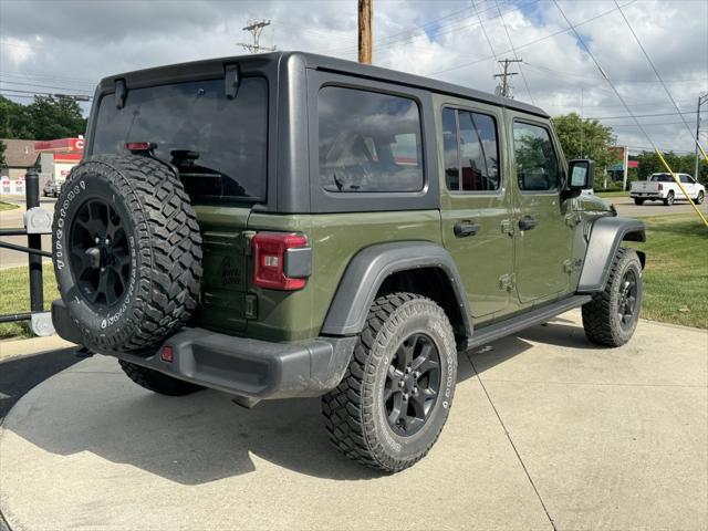 used 2021 Jeep Wrangler car, priced at $33,298