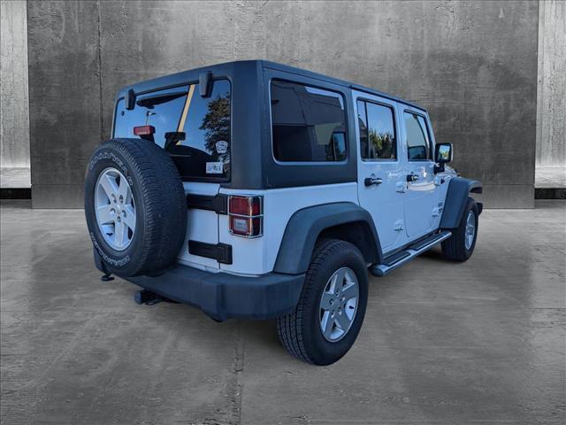 used 2013 Jeep Wrangler Unlimited car, priced at $13,998