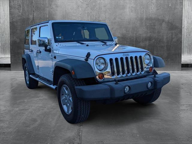 used 2013 Jeep Wrangler Unlimited car, priced at $13,998