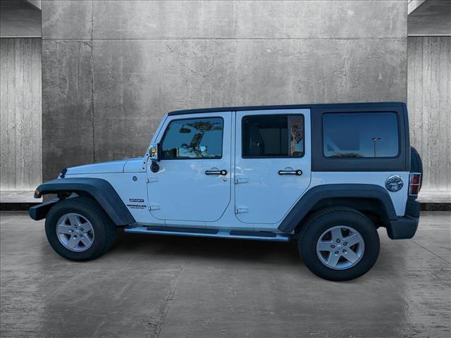 used 2013 Jeep Wrangler Unlimited car, priced at $13,998