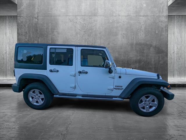 used 2013 Jeep Wrangler Unlimited car, priced at $13,998