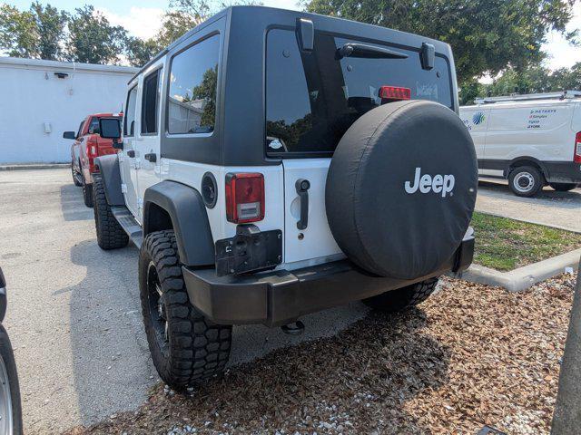 used 2016 Jeep Wrangler Unlimited car, priced at $20,679