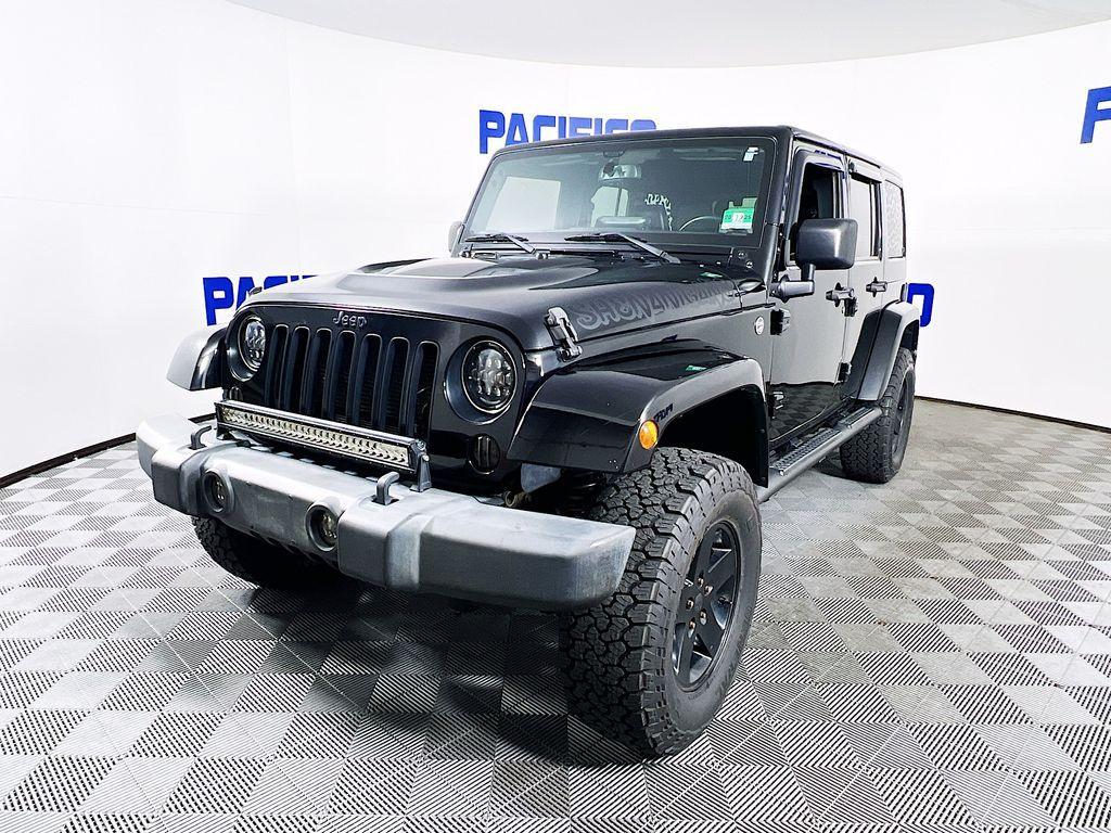 used 2015 Jeep Wrangler Unlimited car, priced at $16,499