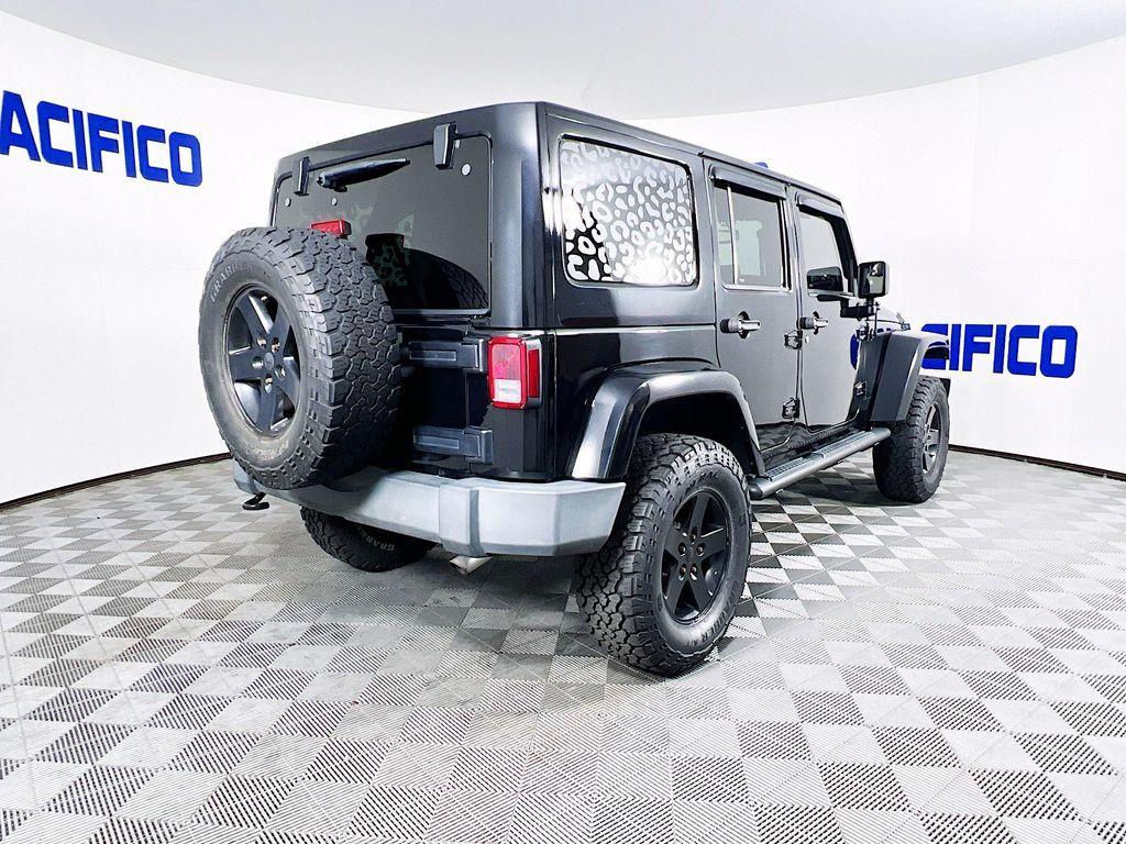 used 2015 Jeep Wrangler Unlimited car, priced at $16,499