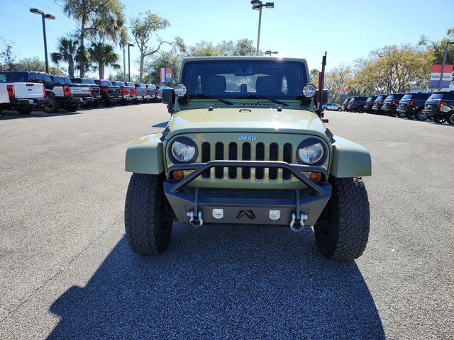 used 2013 Jeep Wrangler Unlimited car, priced at $16,264