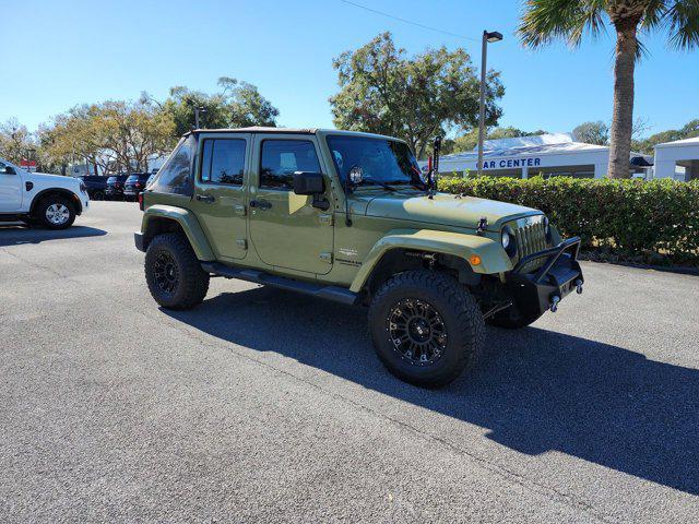 used 2013 Jeep Wrangler Unlimited car, priced at $16,264