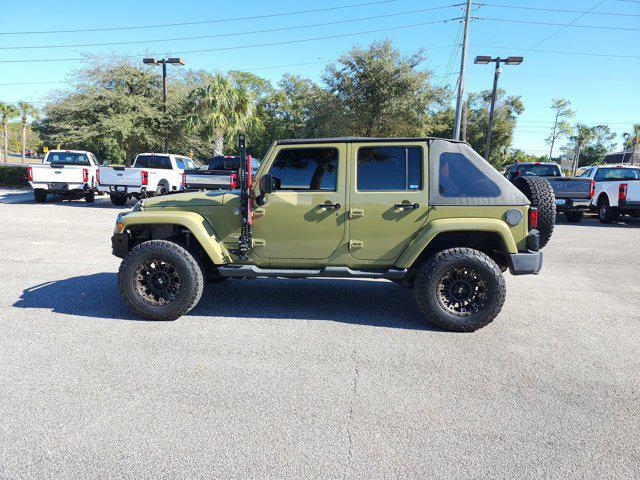 used 2013 Jeep Wrangler Unlimited car, priced at $16,264