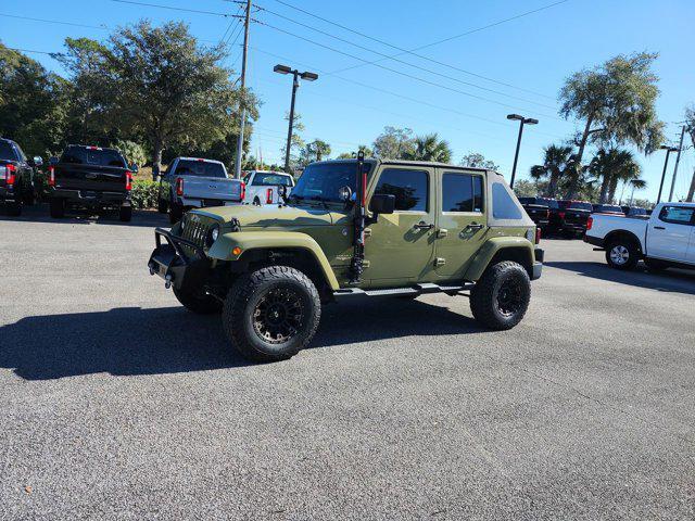 used 2013 Jeep Wrangler Unlimited car, priced at $16,264