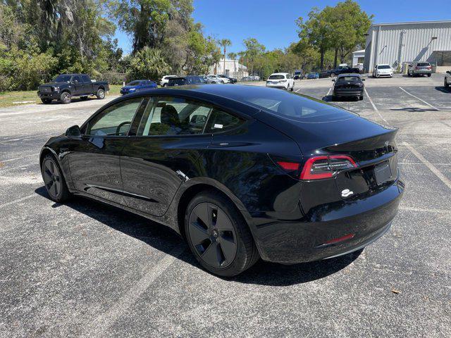 used 2023 Tesla Model 3 car, priced at $21,999