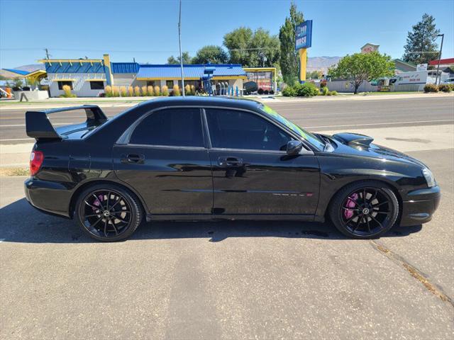 used 2004 Subaru Impreza car, priced at $19,999