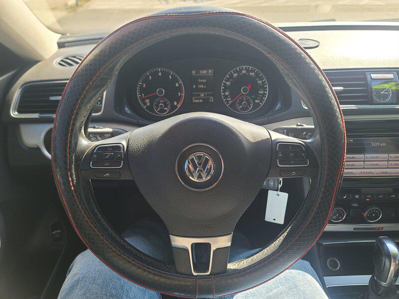 used 2013 Volkswagen Passat car, priced at $7,499