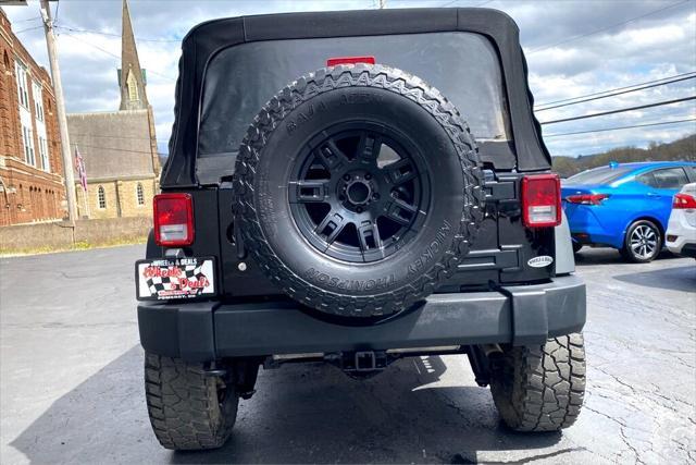 used 2015 Jeep Wrangler Unlimited car, priced at $18,790