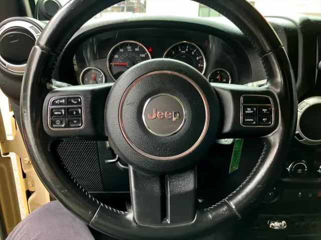 used 2011 Jeep Wrangler Unlimited car, priced at $13,995