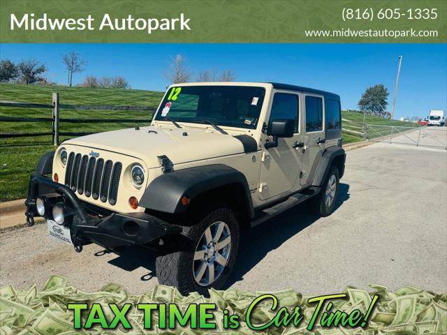 used 2012 Jeep Wrangler Unlimited car, priced at $16,950