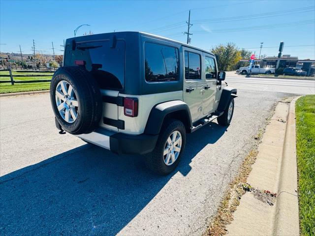 used 2012 Jeep Wrangler Unlimited car, priced at $16,950