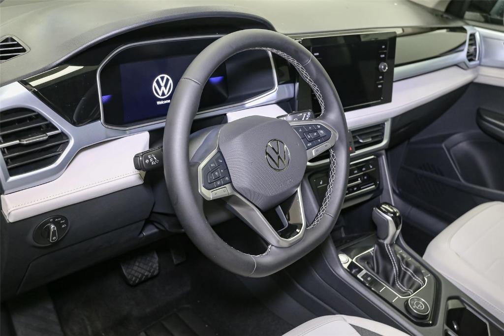 new 2025 Volkswagen Taos car, priced at $30,292