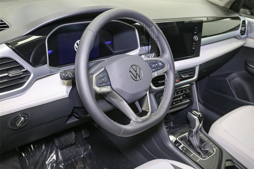 new 2025 Volkswagen Taos car, priced at $28,806