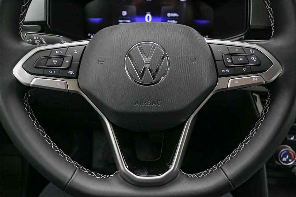 new 2025 Volkswagen Taos car, priced at $26,999