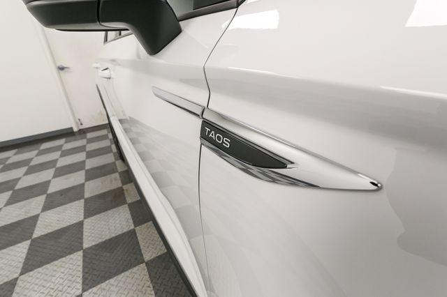 used 2024 Volkswagen Taos car, priced at $23,597