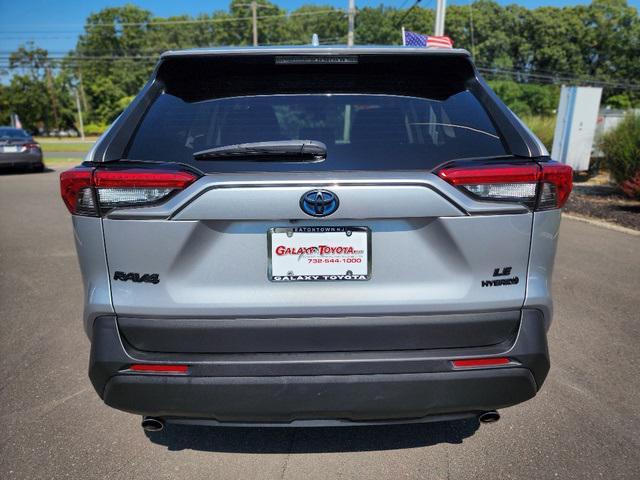 used 2021 Toyota RAV4 Hybrid car, priced at $18,999