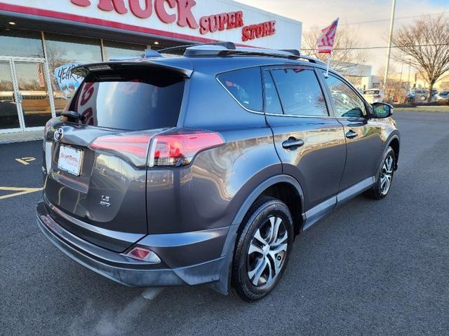 used 2016 Toyota RAV4 car, priced at $17,599