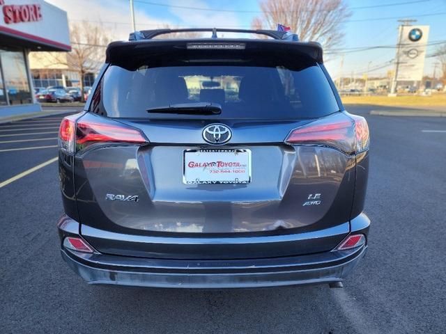 used 2016 Toyota RAV4 car, priced at $17,599