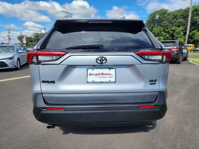 used 2021 Toyota RAV4 car, priced at $27,999