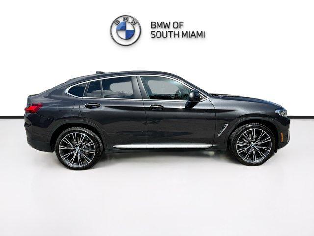 used 2025 BMW X4 car, priced at $58,500