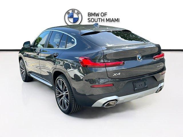 used 2025 BMW X4 car, priced at $58,500