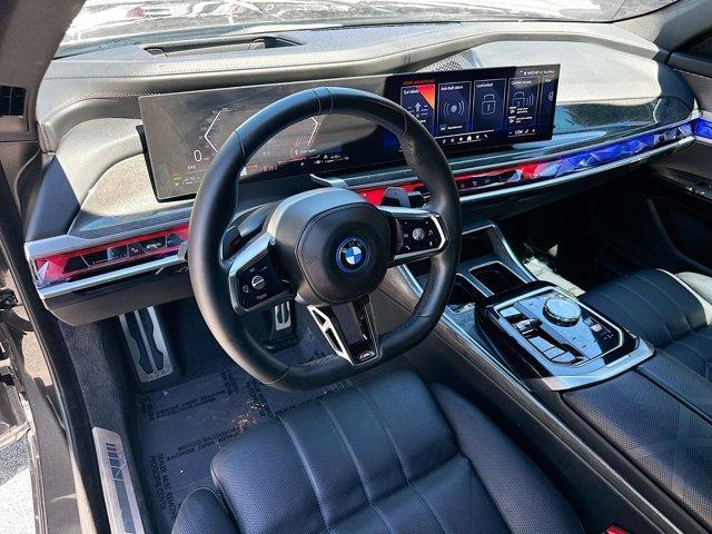 used 2024 BMW 750e car, priced at $74,750
