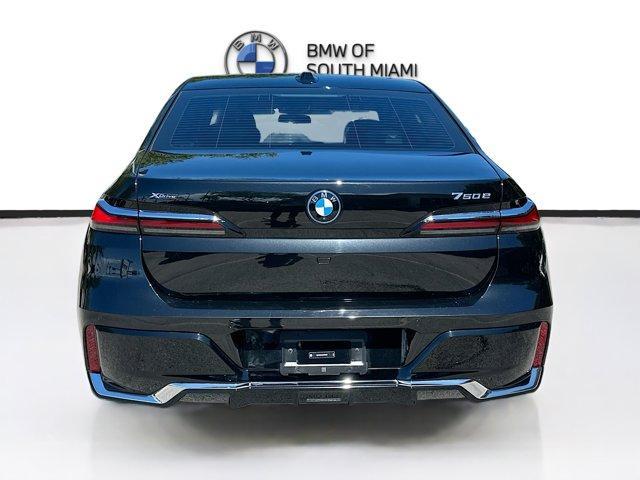 used 2024 BMW 750e car, priced at $74,750