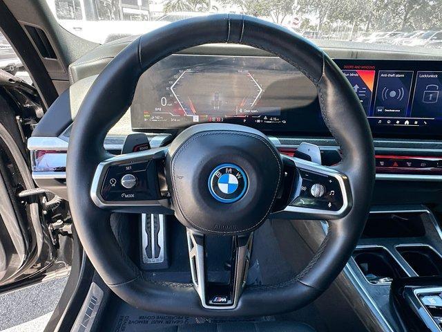 used 2024 BMW 750e car, priced at $74,750