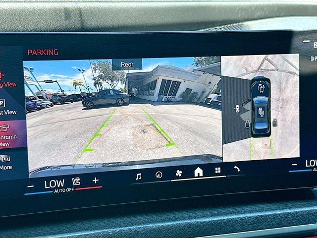 used 2024 BMW 750e car, priced at $74,750