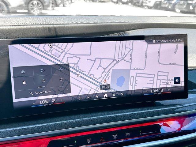 used 2024 BMW 750e car, priced at $74,750