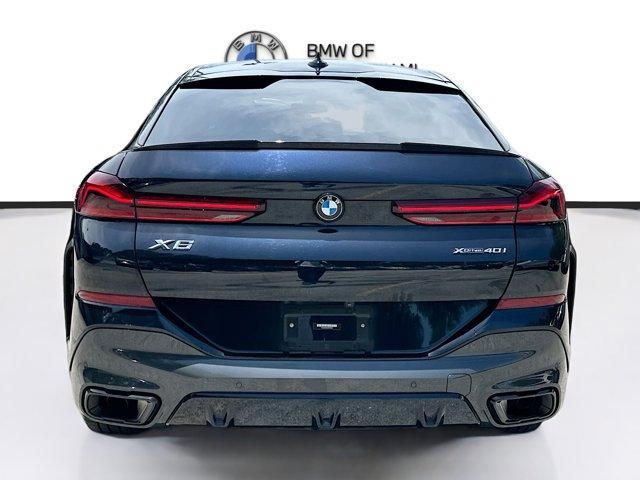 used 2023 BMW X6 car, priced at $55,000