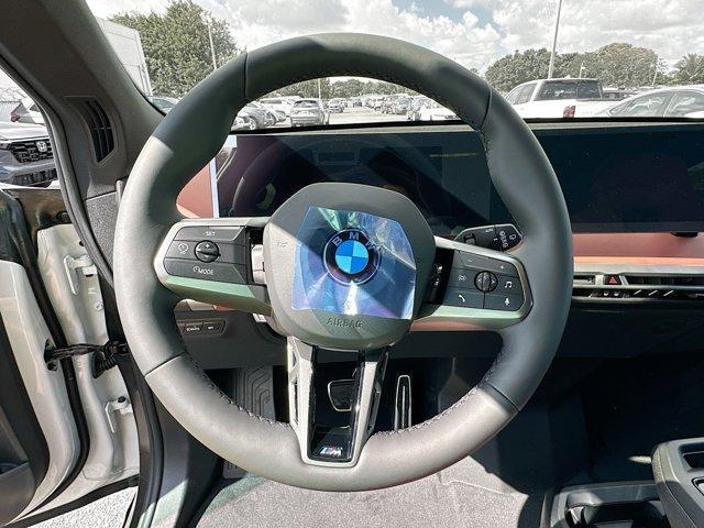 new 2026 BMW iX car, priced at $88,614