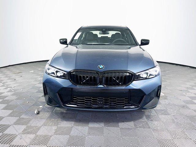 new 2025 BMW 330 car, priced at $50,044