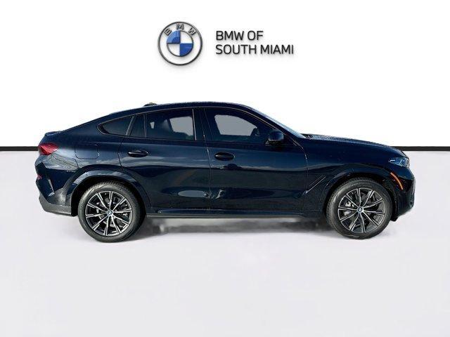 new 2025 BMW X6 car, priced at $77,875