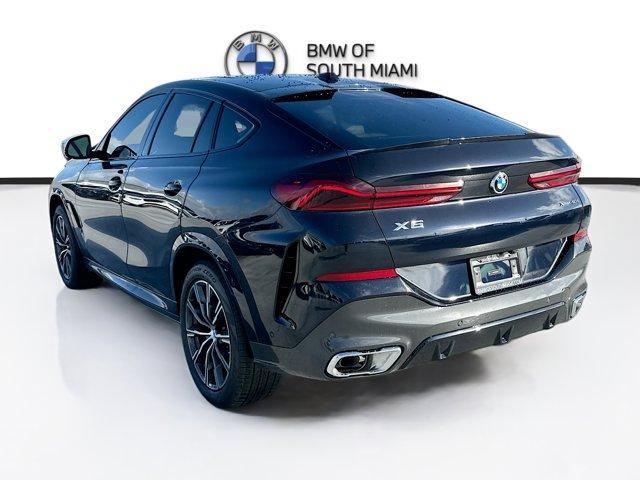 new 2025 BMW X6 car, priced at $77,875