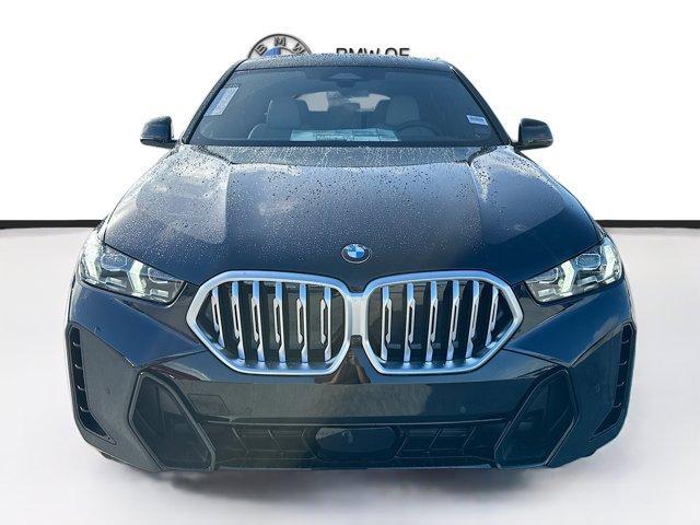 new 2025 BMW X6 car, priced at $77,875